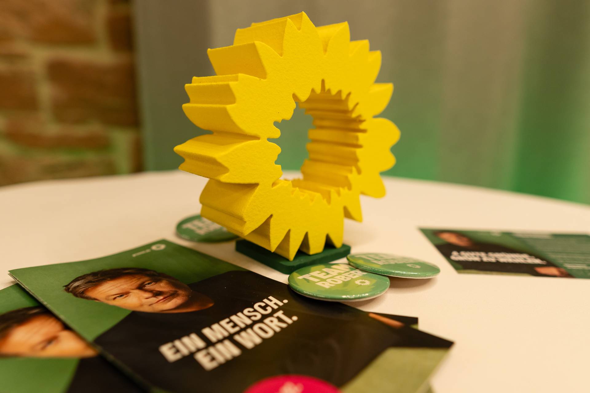 Die Sonnenblume, das grüne Logo.